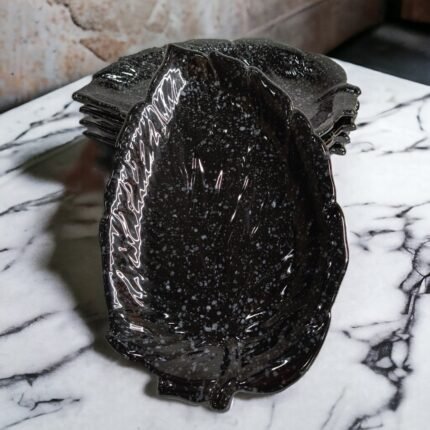 Glossy black ceramic platter for snacks and appetisers