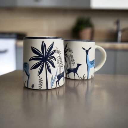 Ceramic coffee mug with stag artwork for everyday beverages