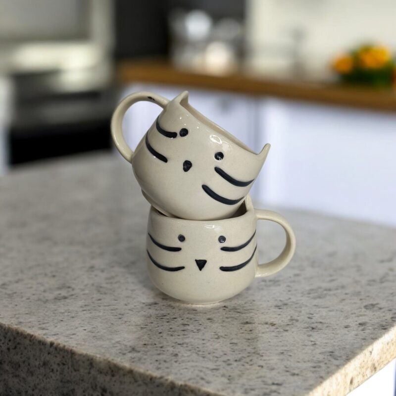 Cute ceramic mug with kitty face design