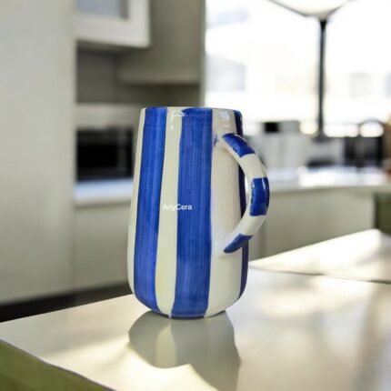 One litre ceramic pitcher with hand-painted blue stripes