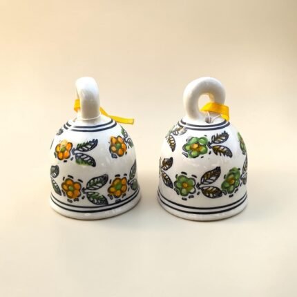 Decorative ceramic hanging bells with yellow and green floral painting