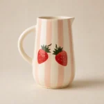 Handmade ceramic water jug with pink stripes and handpainted strawberries, 1 litre capacity